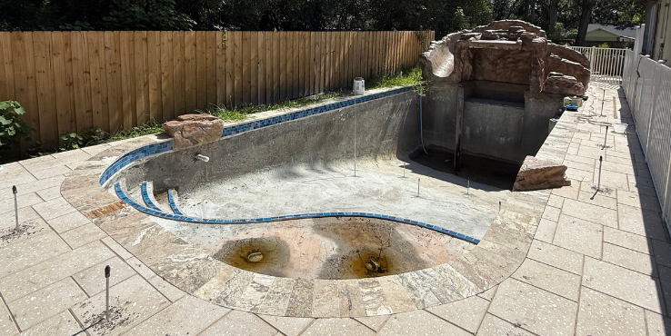 Structural polyurethane injection points inside and around a pool.